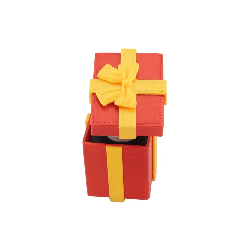 Holiday Gift Box Musical Click Toy – Pop-Up Sound Fidget with Festive Red & Yellow Present Design Sancticraft