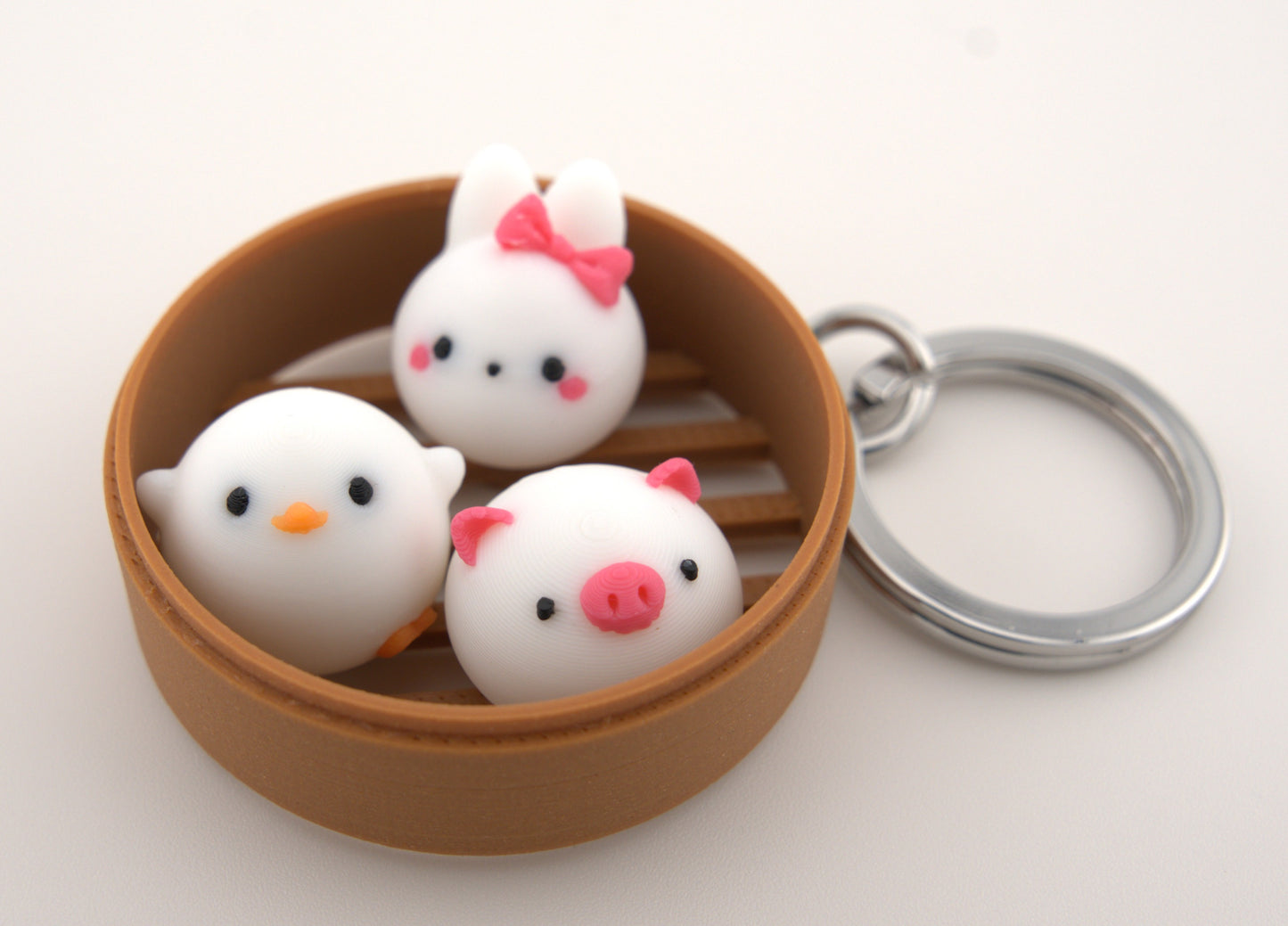 Dim Sum Pro 🌟 – Customizable Animal Keychain with Wood Infused Steamer and Premium Keychain