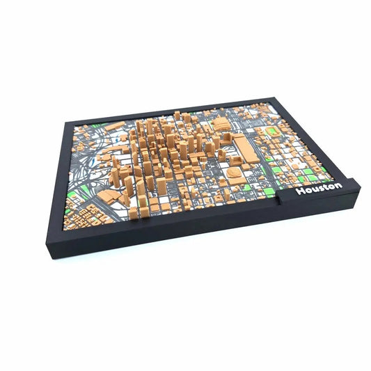 Framed 3D Houston city map with raised downtown buildings and street grid