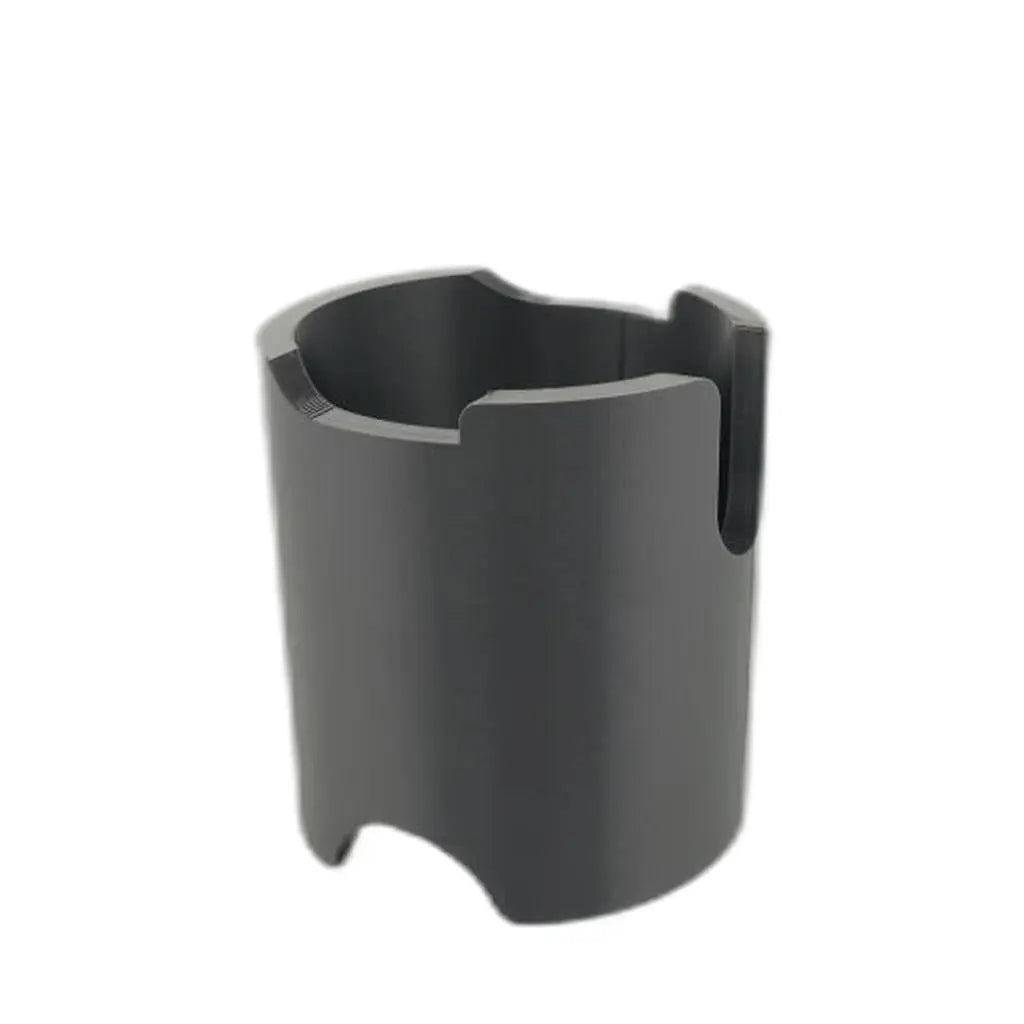 Matte black cylindrical stand holding a 58mm espresso tamper upright