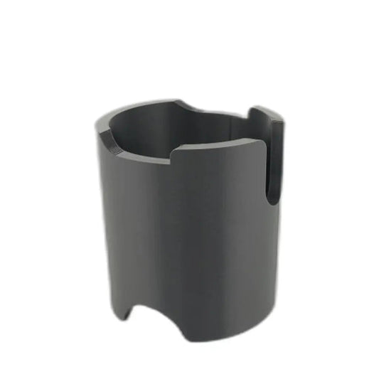 Matte black cylindrical stand holding a 58mm espresso tamper upright