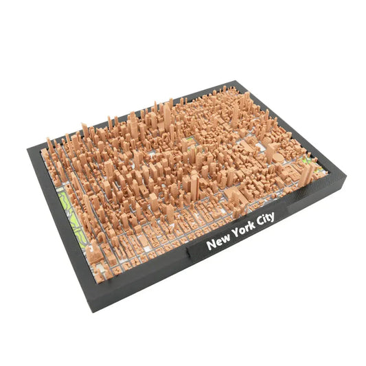 Framed 3D Manhattan map showing dense city blocks and street grid in miniature