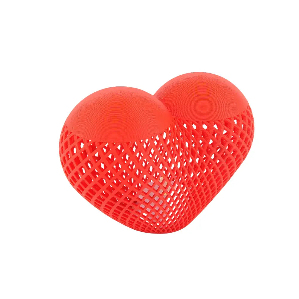 Heart shaped bedside lamp with a warm glow