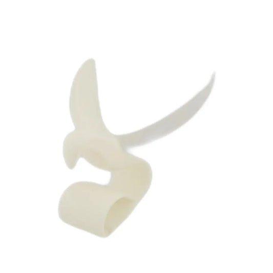 White abstract dove sculpture with sweeping wings on a curled base