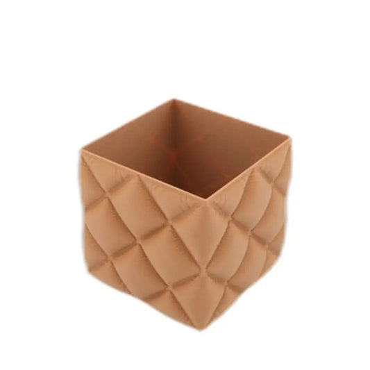 Brown quilted cube pen holder, a neutral small gift