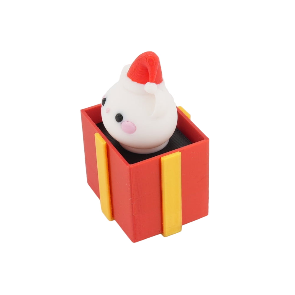 Mini Christmas Surprise Gift Box Figurine – Cute Santa Hat Character in Red Holiday Present | Decorative Desk Accent and Stocking Stuffer