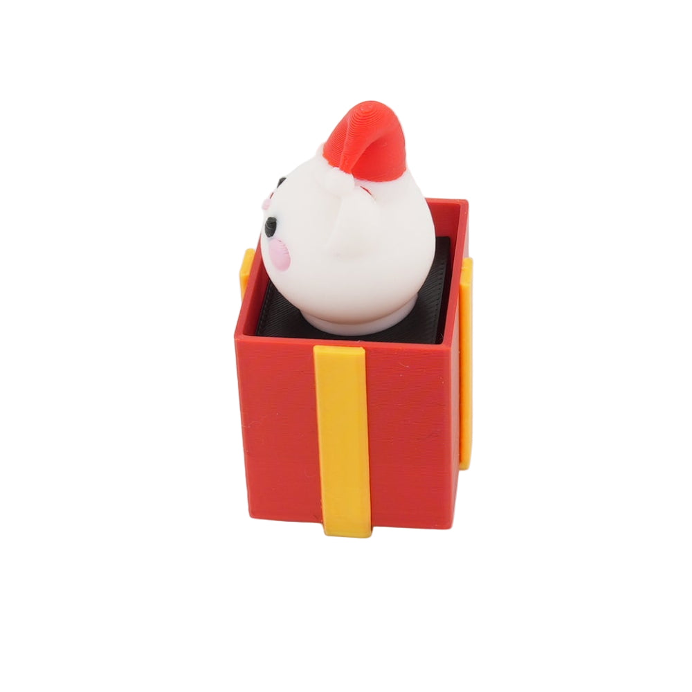 Mini Christmas Surprise Gift Box Figurine – Cute Santa Hat Character in Red Holiday Present | Decorative Desk Accent and Stocking Stuffer