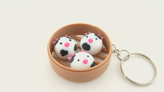 Cow Dim Sum Bun Keychain 🐮 – Utterly Adorable Must-Have for Animal Lovers! 🐮