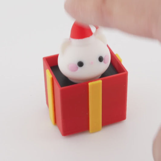 Mini Christmas Surprise Gift Box Figurine – Cute Santa Hat Character in Red Holiday Present | Decorative Desk Accent and Stocking Stuffer